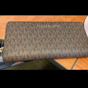 MK zippered wallet . New with tags